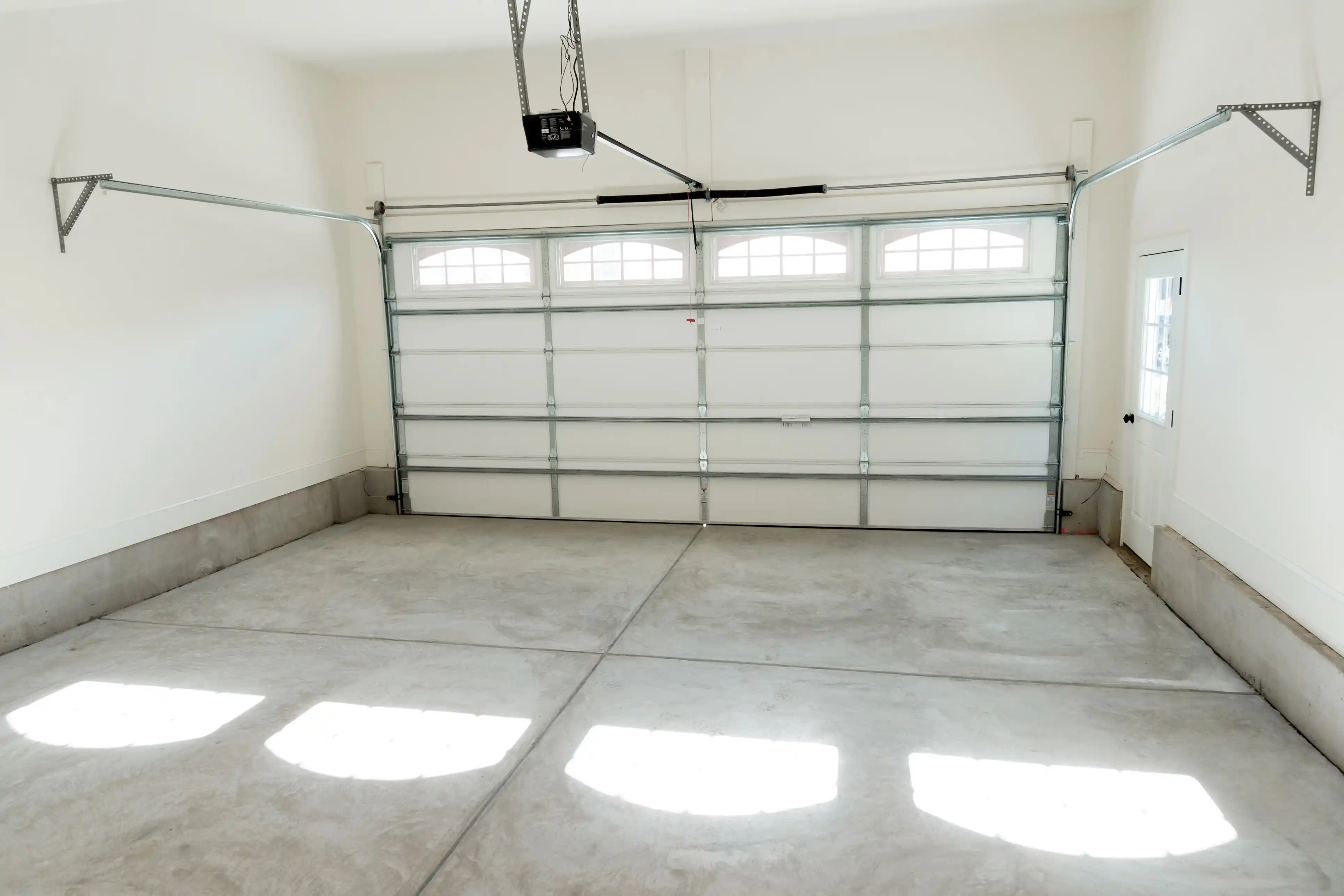 Garage door installation contractor working on a home in Salt Lake City